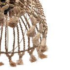Close-up of a textured woven object with braided ropes on a white background